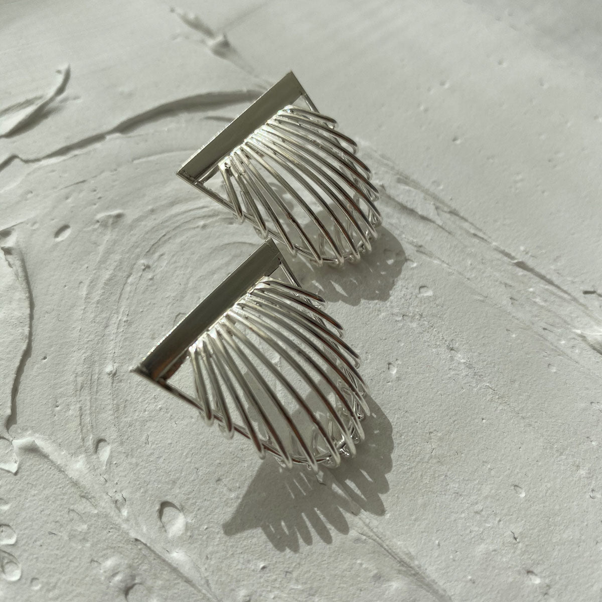 aretes-plata-lineas-hongos-minimalistas