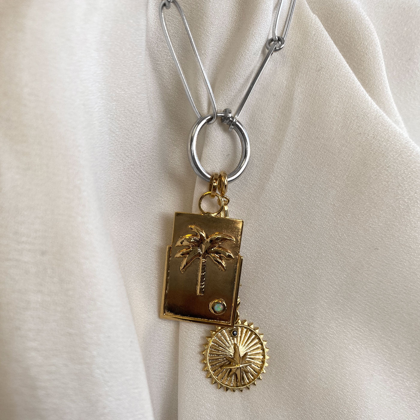 cadena plata gruesa corta dije de palmera medallon de estrellas diseñadores colombianos
