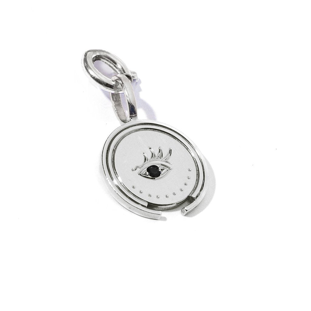 moneda sohum plata ojo hecho a mano joyas misticas colombia