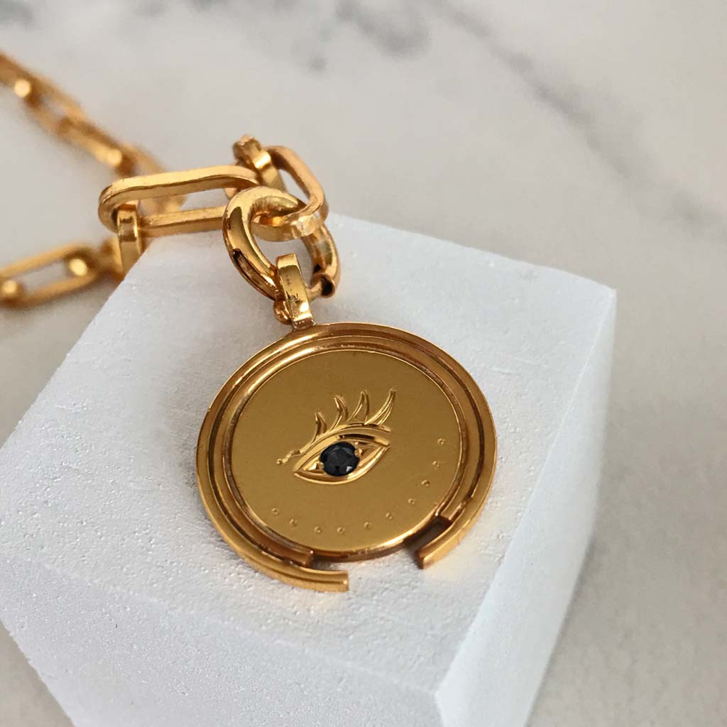 moneda sohum plata ojo hecho a mano joyas misticas colombia ana buendia