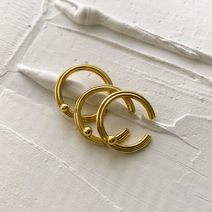 ear cuff plata oro elegante minimalista textura